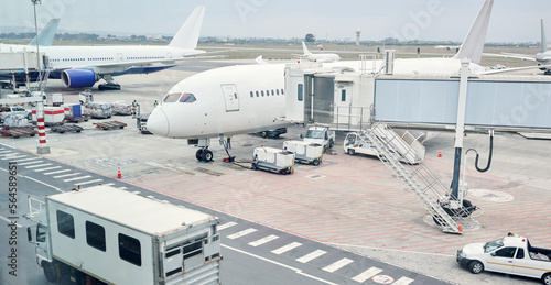 Airport runway, travel and cargo for airplane for takeoff, international flight and commercial transportation. Air transport, global destination and plane loading baggage, luggage and boarding