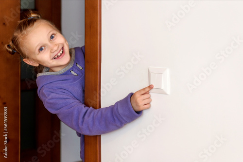 фотографія Turning off Light, Switch off Light, Save Energy, Energy Crisis concept