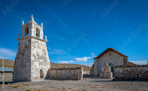 Historic church of the tiny village of Guallatiri, typical of churches on the high altitude plateau of the Andes (Altiplano) in northern Chile photo