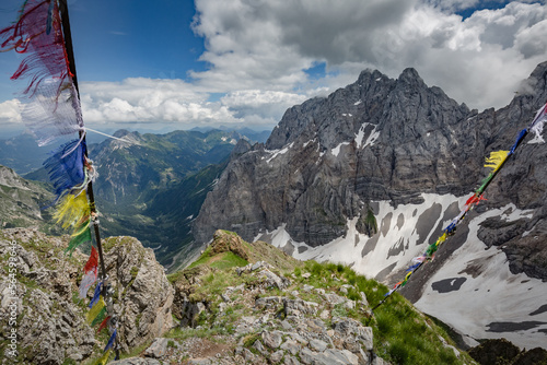 Between Italy and Austria: on the top of mountain near Volaia Lake Raunchkofer Mountain (Lago di Volaia Monte). Mountain hiking Trail Road.