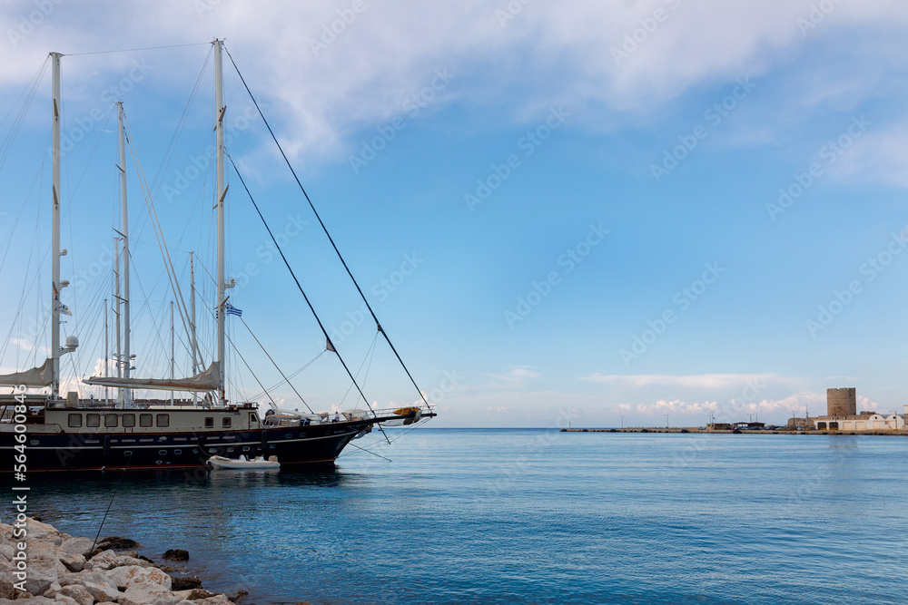 Panoramic view of beautiful yachts stand in harbor in port of Rhodes, Greece. High quality photo