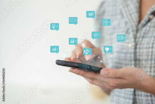 close up finger pointing at screen of smartphone with notification social media icons, internet digital marketing concept.