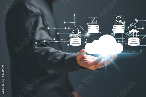 A Database administrators backup company and customer data concept. Databases, computer, DBMS, DBA, database, SQL, and cloud stored. Software engineering is restoring data to servers. black background photo