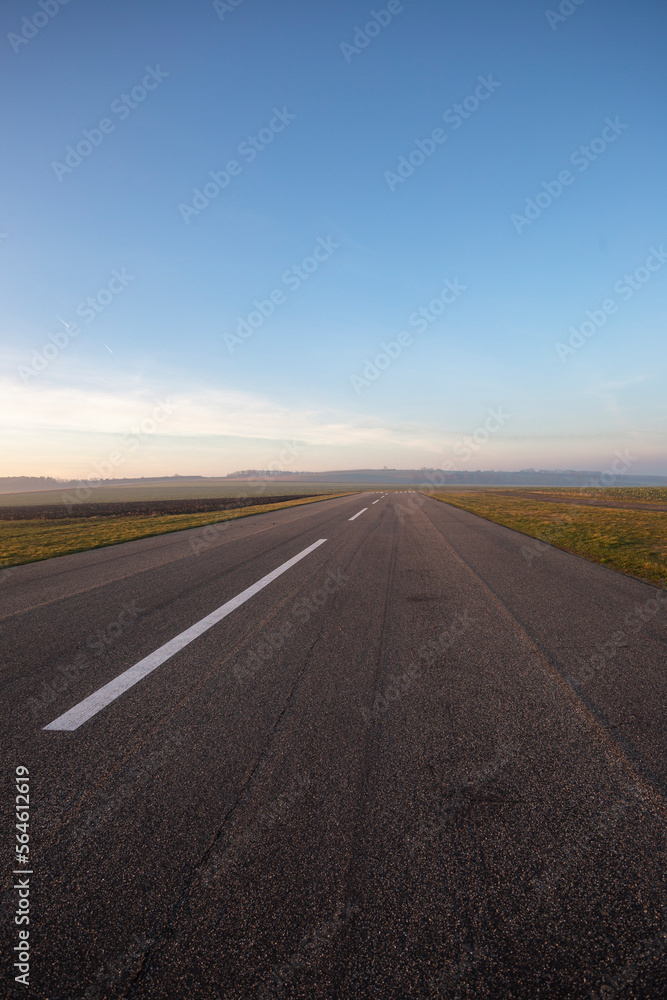 Naklejka premium Small empty field airport with asphalt runway