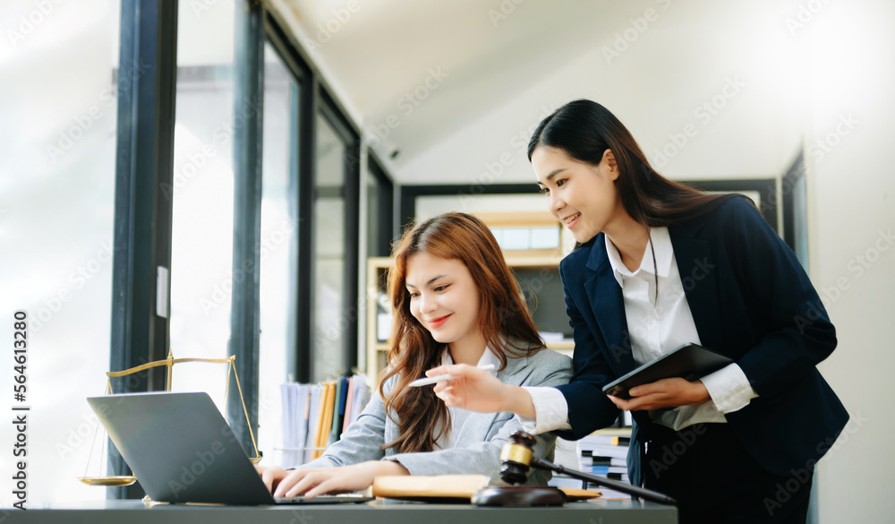 business Asian people and lawyers discussing contract papers sitting at the table. Concepts of law, advice, legal services. business Asian people and lawyers discussing contract papers sitting at the table. Concepts of law, advice, legal services.