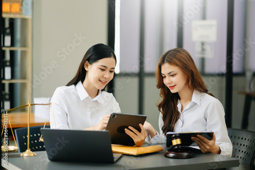 Business and Female lawyer or judge consult having team meeting with client, Law and Legal services concept.Customer service good cooperation in office.