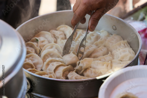 Vegetarian traditional dumpling momos. Tibetan momo Street food in Mall road Kullu Manali Himachal Pradesh India.	
