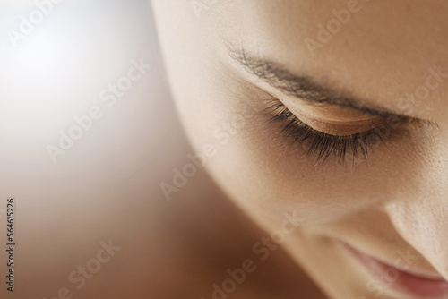 Canvas Print Beautiful female face, with smooth and flawless skin and closed eyes, evokes a s