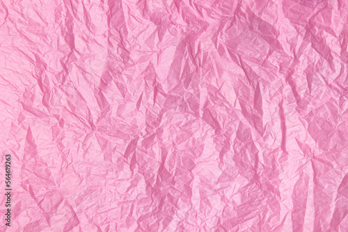 Background from delicate pink crumpled paper. Lots of empty space