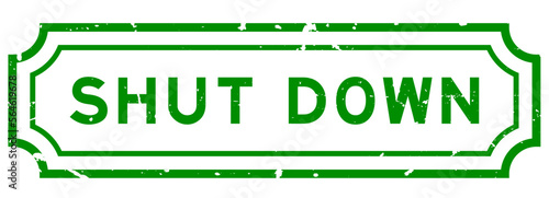 Grunge green shut down word rubber seal stamp on white background