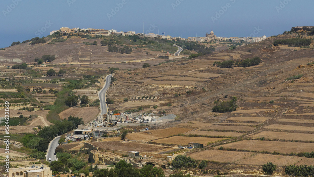 The dusty view across the small island of Gozo, Malta from the citadel, in Victoria
