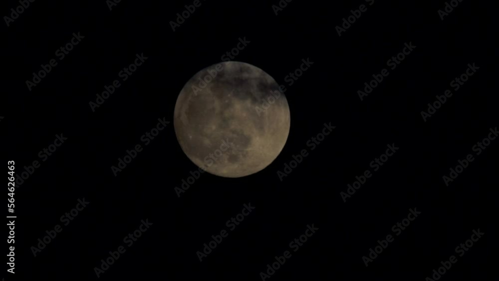 A full moon emerges from the clouds A full moon emerges from the clouds