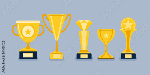 Beautiful golden trophy cups and awards of different shape realistic set isolated on background vector illustration