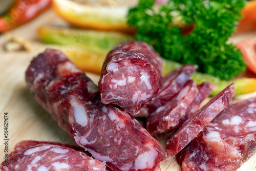 Veal sausage on the table during cooking