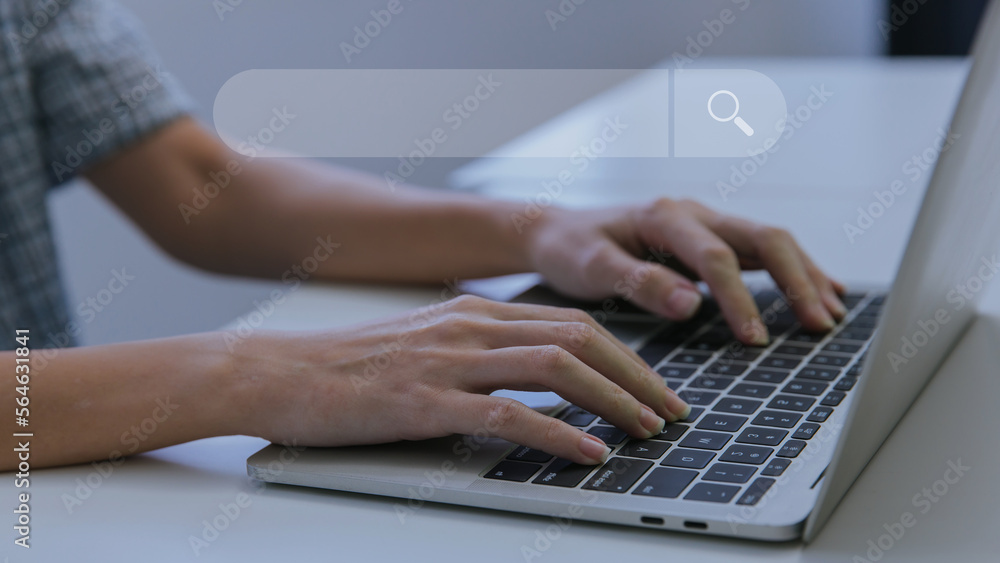 Woman hand using laptop or computor searching for information in internet online society web. Searching information data on internet networking concept. Data Search Search Engine Optimization. Woman hand using laptop or computor searching for information in internet online society web. Searching information data on internet networking concept. Data Search Search Engine Optimization.