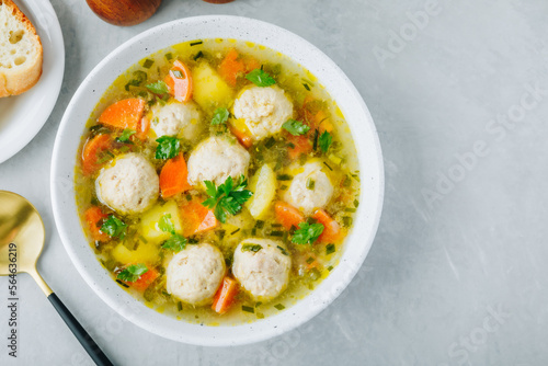 Meatballs soup. Chicken turkey vegetables meatballs soup with carrots and potatoes.