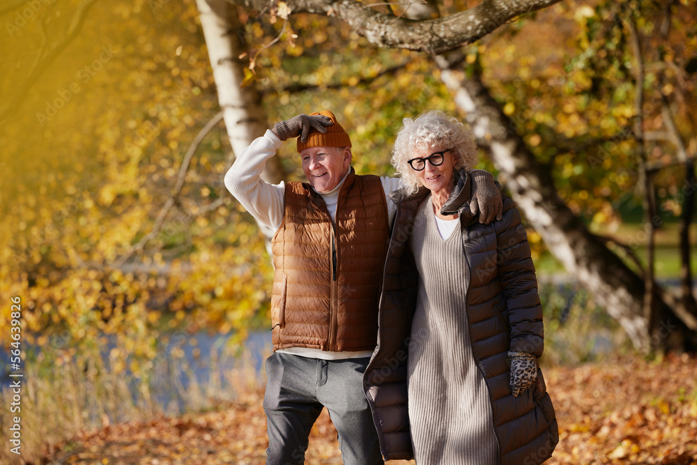 Senior couple in autumn scenery Senior couple in autumn scenery