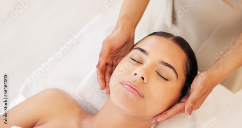 Relax  woman and spa face massage for a woman for glowing  smooth and healthy skincare treatment at a salon. Beauty  detox and hands healing a young client in a facial physical therapy session
