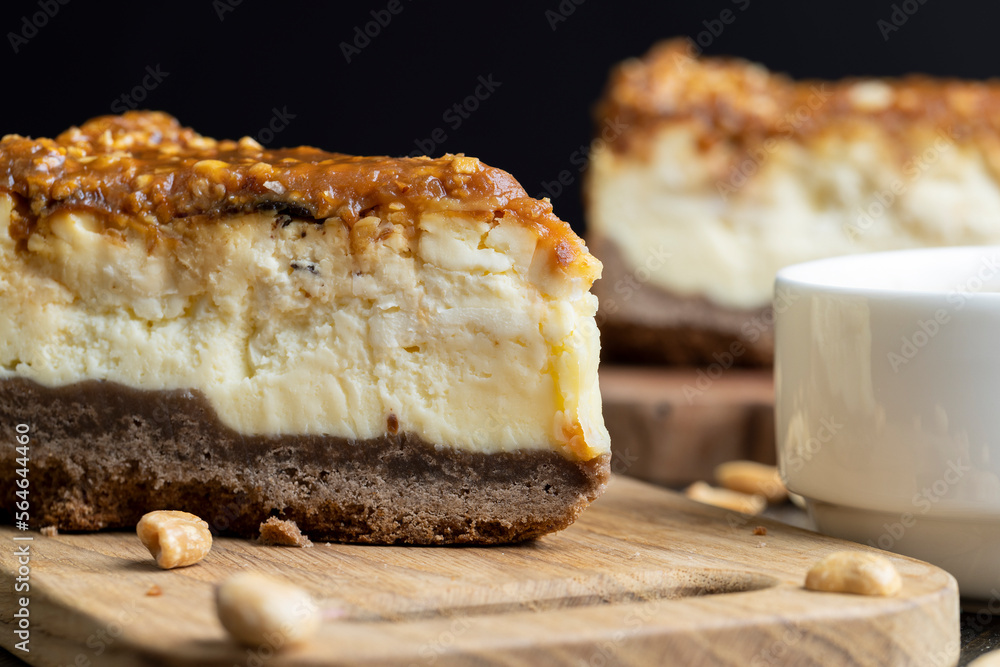 Cheesecake made of dairy products and peanuts in caramel