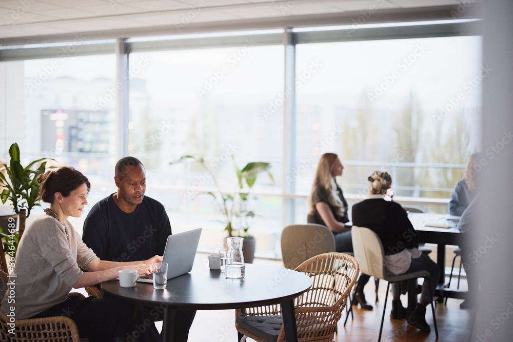 People talking in cafeteria People talking in cafeteria