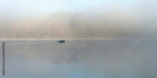 Fog on banks of Finnish Tuusula lake: morning, autumn, tranquility.