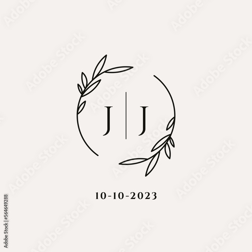 Letter JJ wedding monogram logo design with simple natural circle leaf frame