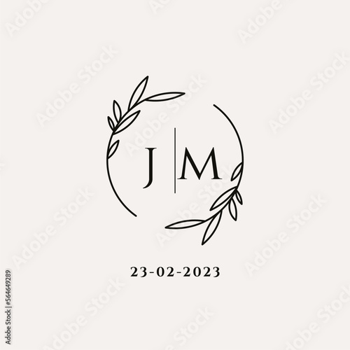 Letter JM wedding monogram logo design with simple natural circle leaf frame