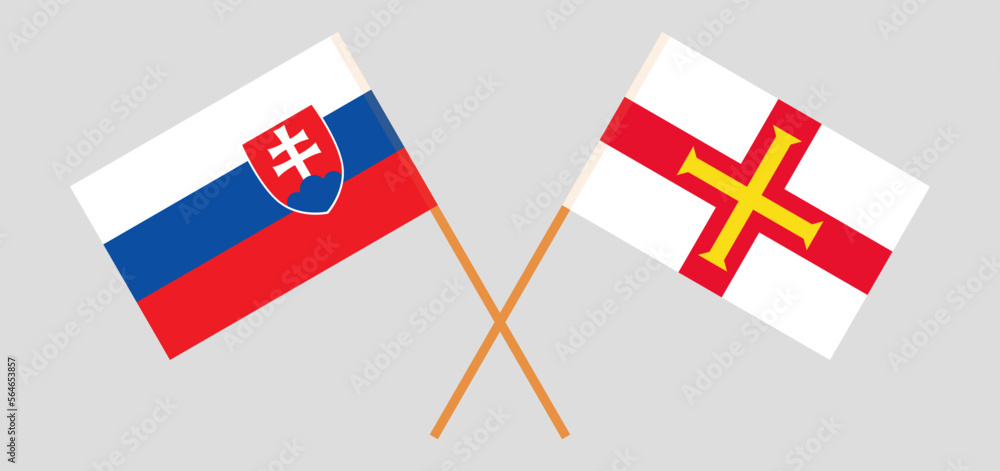 Crossed flags of Slovakia and Bailiwick of Guernsey. Official colors. Correct proportion
