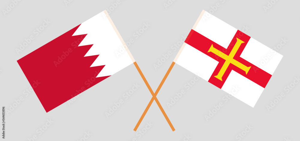 Crossed flags of Bahrain and Bailiwick of Guernsey. Official colors. Correct proportion