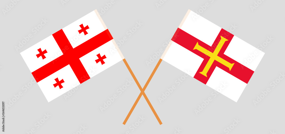 Crossed flags of Georgia and Bailiwick of Guernsey. Official colors. Correct proportion