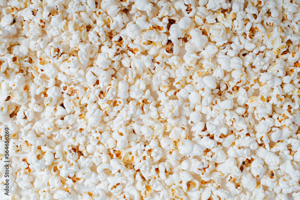 Popcorn top view. Heap of sweet corn food background Popcorn top view. Heap of sweet corn food background