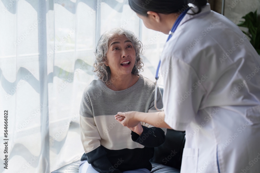 Home healthcare nurse, physical therapy with senior adult woman at home Home healthcare nurse, physical therapy with senior adult woman at home