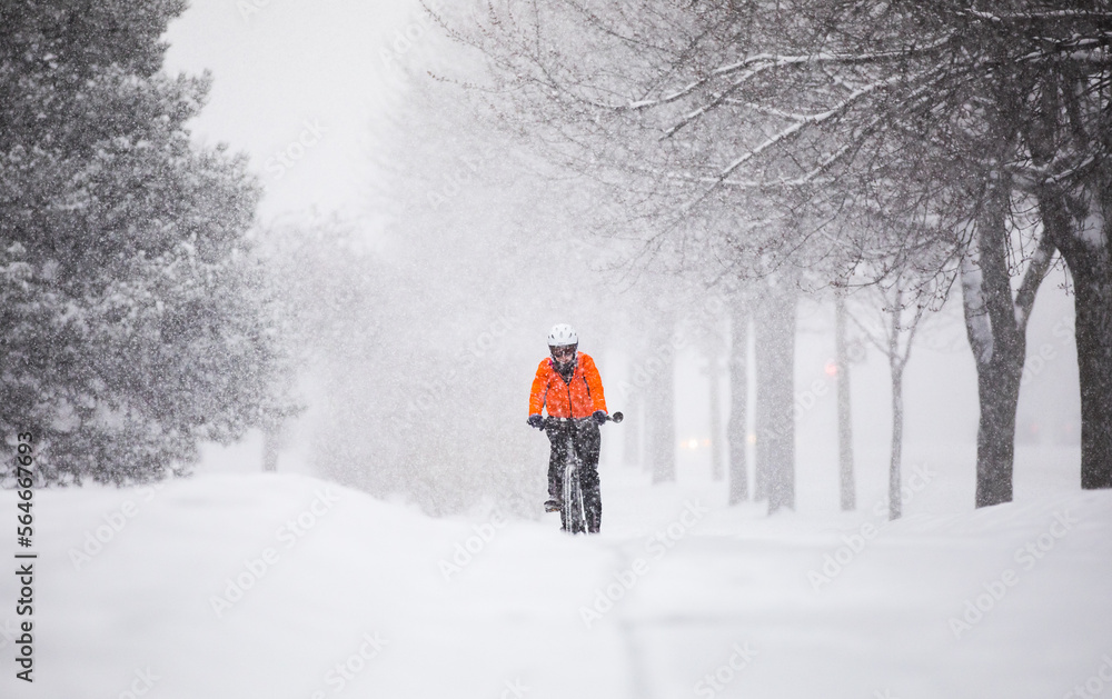 Cyclist during heavy snow