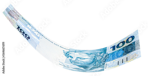 banknote of one hundred reais from brazil falling on isolated white background photo