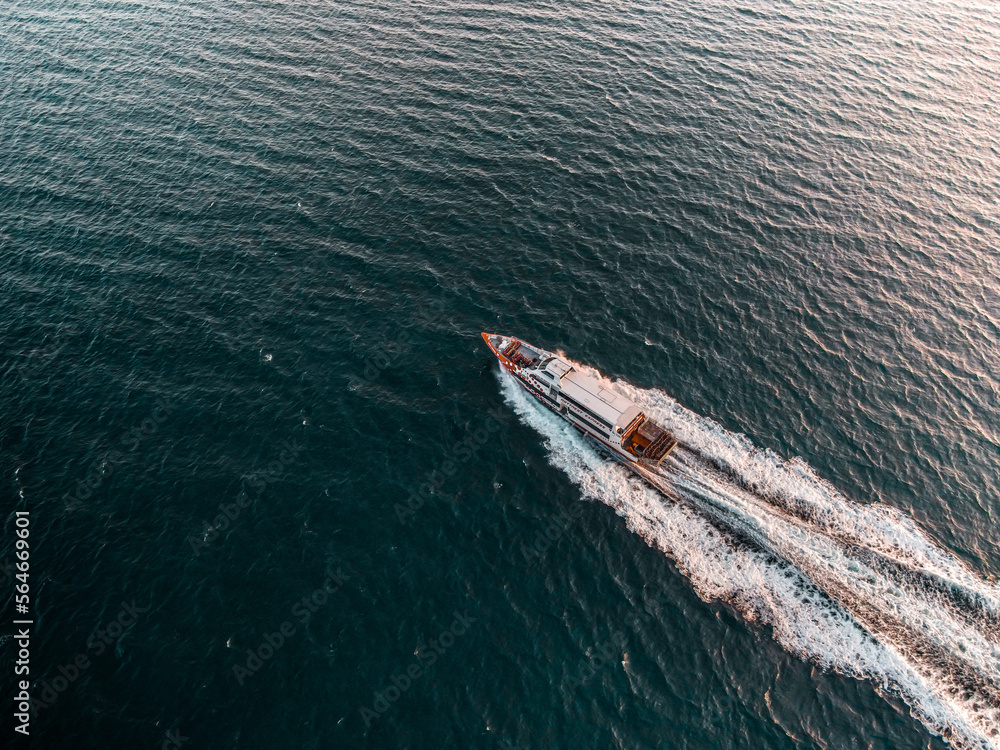 Fototapeta premium Rotnest Island Ferry underway from above on calm morning.