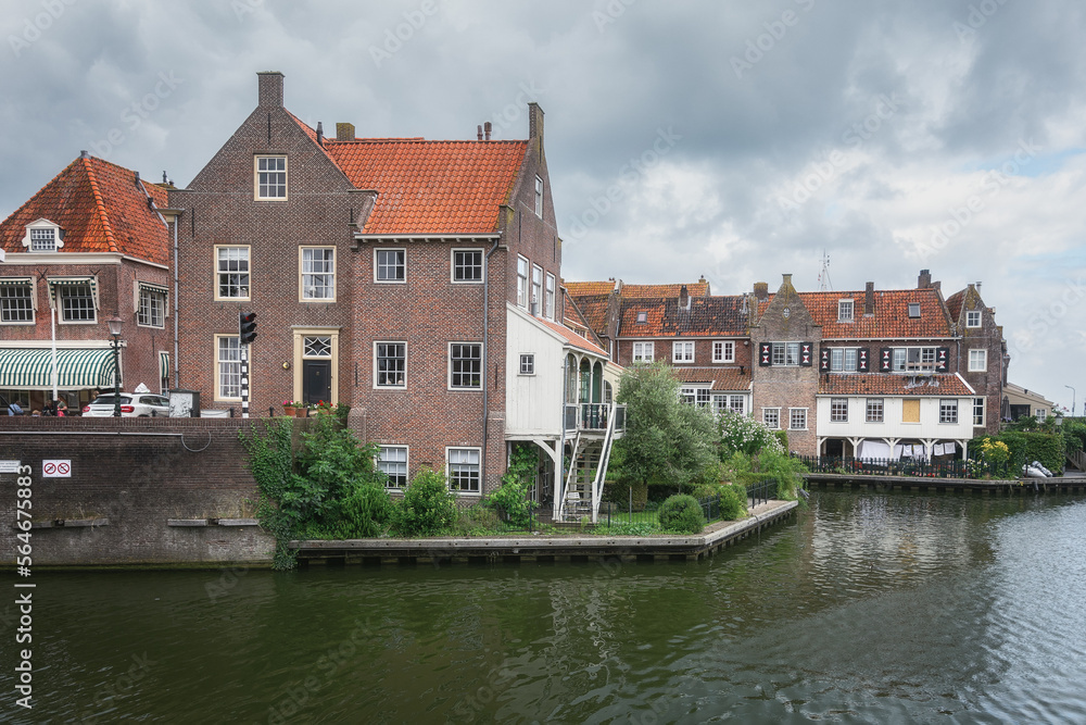 View of the historic harbor with its characteristic houses of Enkhuizen, the Netherlands. View of the historic harbor with its characteristic houses of Enkhuizen, the Netherlands.