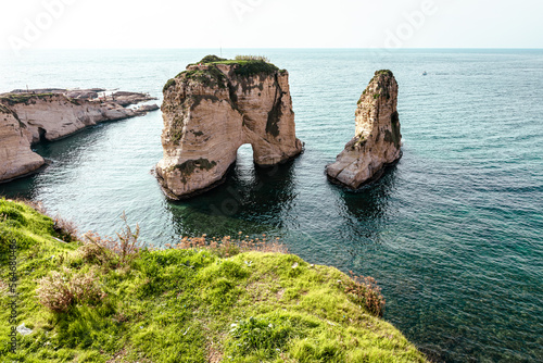 Raouche Rocks in Beirut  Lebanon in the sea during daytime. Pigeon Rocks in Mediterranean Sea. Popular Tourist Destination in Beirut. 