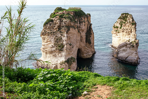 Raouche Rocks in Beirut, Lebanon in the sea during daytime. Pigeon Rocks in Mediterranean Sea. Popular Tourist Destination in Beirut. 