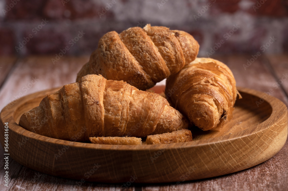 Croissants lie on the table in the kitchen 
