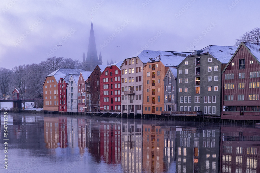 Walking along the Nidelven (river) on a cold winter's day in Trondheim city, Trøndelag, Norway	