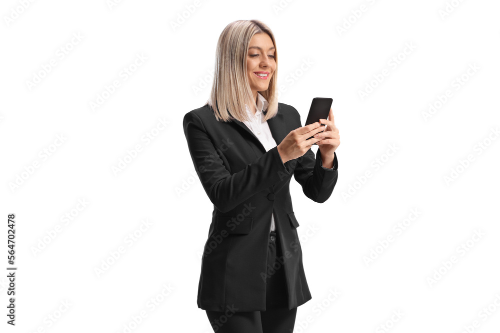 Young businesswoman typing on a smartphone Young businesswoman typing on a smartphone