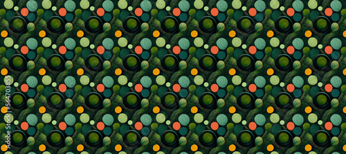 Intersecting circles of various colors on a dark forest green background 