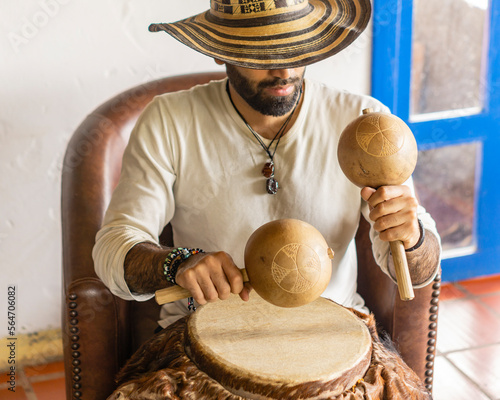 musician playing colombian cumbia photo