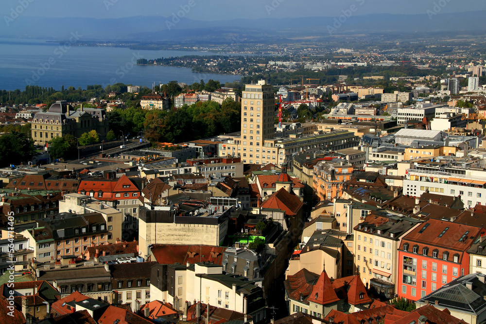 A panoramic view of the city of Lausanne, Lake Geneva and the mountains in the background