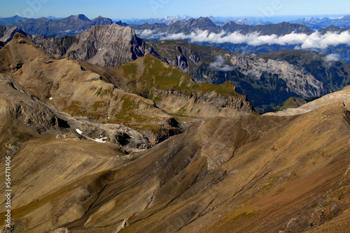 Panoramic view of the landscape with mountains in the foreground against a blue sky with clouds on Mount Schilthorn, near Lauterbrunnen and Interlaken in Switzerland