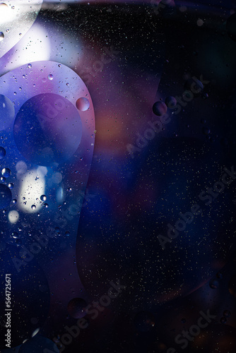 Photo of oil on a water surface with bubbles. Abstract colorful background. Macro close-up  not illustration