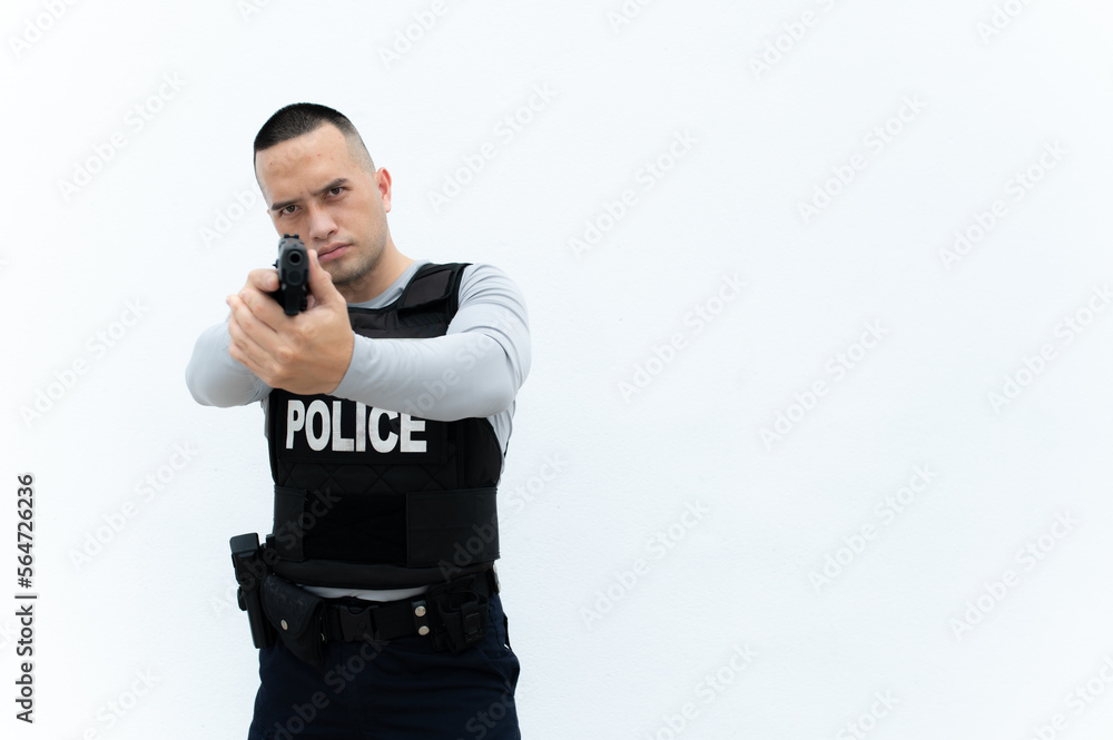 Portrait of police hold gun in hand on white background,Handsome asian cop Portrait of police hold gun in hand on white background,Handsome asian cop