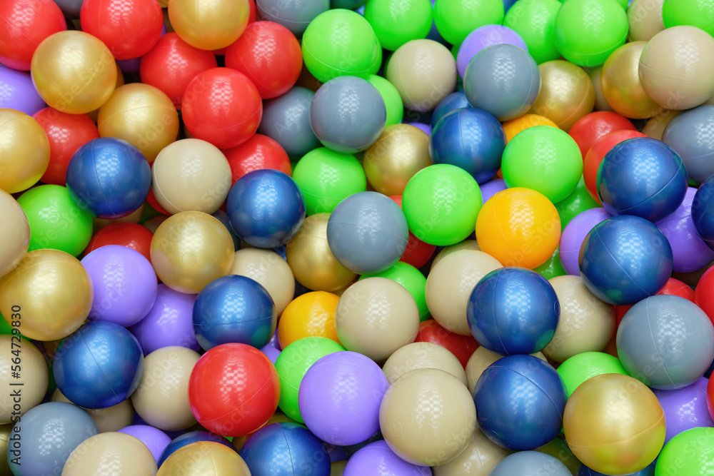 A bunch of colorful plastic balls in the game center. View from above. A place to copy A bunch of colorful plastic balls in the game center. View from above. A place to copy