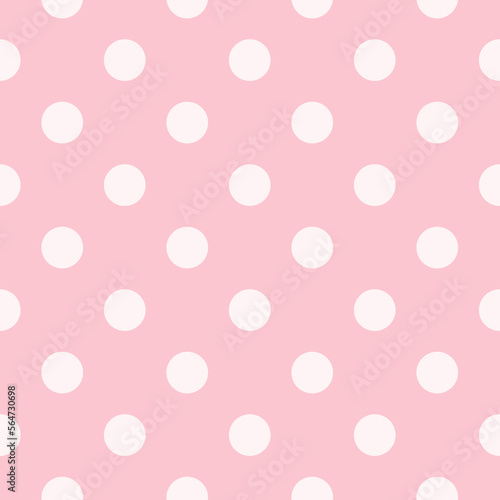 Polka dot seamless pattern in pink and white. Minimal fashionable design. Polka dots trendy background, tile. For fabric pattern, card, decor, wrapping paper