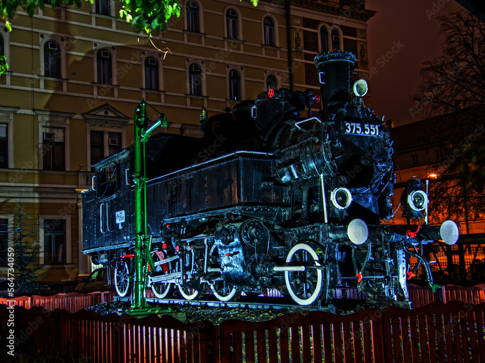 Lighting old steam locomotive in the night Szeged